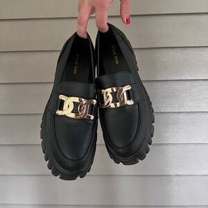 Platform loafers with metal chain accent